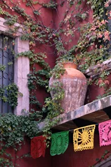 Mexico, San Miguel de Allende, Ivy, clay pot, and banners Mexico, San Miguel de Allende, Ivy, clay pot, and banners