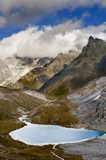 Milk Lake and clearing storm, Yading Nature Reserve, near Daocheng Milk Lake and clearing storm, Yading Nature Reserve, near Daocheng