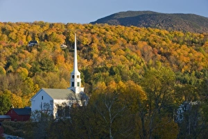 The moon, a church, and fall foliage in Stowe, Vermont The moon, a church, and fall foliage in Stowe, Vermont