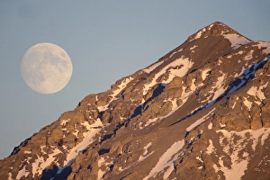 full moon over Gates of the Arctic National Park, North Slope of the Brooks Range, Alaska full moon over Gates of the Arctic National Park, North Slope of the Brooks Range, Alaska
