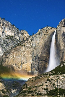 Moonbow and starry sky over Yosemite Falls, Yosemite National Park, California Moonbow and starry sky over Yosemite Falls, Yosemite National Park, California