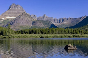 Mountains reflected in Lake. Glacier National Park. Montana. USA Mountains reflected in Lake. Glacier National Park. Montana. USA