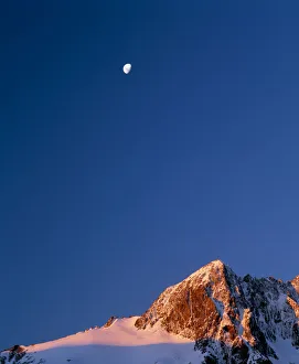 Mt. Crosscut and a rising moon in the evening light, Fjordland Nat' Mt. Crosscut and a rising moon in the evening light, Fjordland Nat'