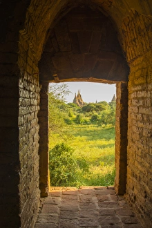 Myanmar. Bagan. View of some pagodas from inside a temple Myanmar. Bagan. View of some pagodas from inside a temple