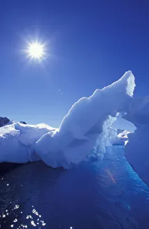 NA, USA, Alaska, Antarctic Peninsula, Paradise Bay. A large iceberg sits grounded NA, USA, Alaska, Antarctic Peninsula, Paradise Bay. A large iceberg sits grounded