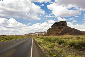 Navajo Nation, Arizona. Back road past a butte Navajo Nation, Arizona. Back road past a butte