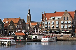 Netherlands, Edam-Volendam, View of the harbor, and the Reformed Church Spire in Netherlands, Edam-Volendam, View of the harbor, and the Reformed Church Spire in