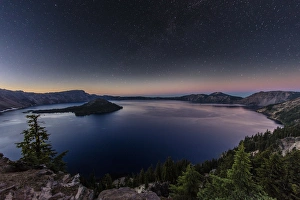 Night time stars over Crater Lake in Crater Lake National Park, Oregon, USA Night time stars over Crater Lake in Crater Lake National Park, Oregon, USA