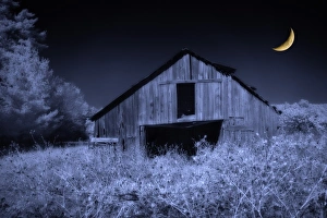North America, USA, North Carolina, digitally altered infrared image of an old barn in North America, USA, North Carolina, digitally altered infrared image of an old barn in