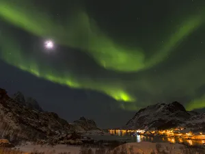 Northern Lights over fjord Maervollspollen and village Maervoll, island Vestvagoy Northern Lights over fjord Maervollspollen and village Maervoll, island Vestvagoy