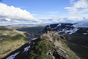 Norway, Troms. NOLS student Elizabeth Champ, Lucia Ballard and Sarah Hiza on a narrow Norway, Troms. NOLS student Elizabeth Champ, Lucia Ballard and Sarah Hiza on a narrow