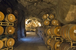 Oak aging barrels in cavern at Ironstone Winery, near Murphys, Calaveras county Oak aging barrels in cavern at Ironstone Winery, near Murphys, Calaveras county