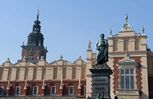 Old bronze statue in center of Main Market Square, Krakow, Poland Old bronze statue in center of Main Market Square, Krakow, Poland