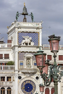 Old Lamppost and the Clock Tower. Venice. Italy Old Lamppost and the Clock Tower. Venice. Italy