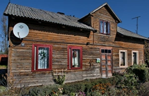 Old traditional wooden house in Marijampole in country near Vilnius, Lithuania Old traditional wooden house in Marijampole in country near Vilnius, Lithuania