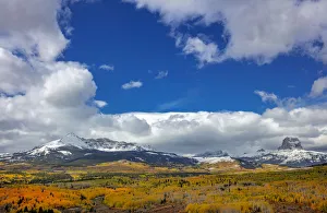 Peak fall color in aspen groves below Yellow and Chief Mountains in Glacier National Park Peak fall color in aspen groves below Yellow and Chief Mountains in Glacier National Park