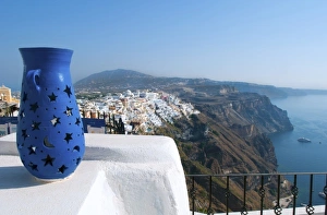 Peak of mountain with vase overlooking Fira at beautiful Santorini Greece in Greek Peak of mountain with vase overlooking Fira at beautiful Santorini Greece in Greek