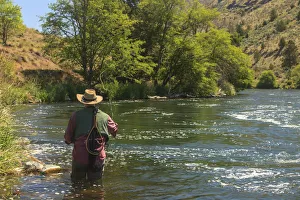 People fly fishing, Lower Deschutes River, Central Oregon, USA (MR) People fly fishing, Lower Deschutes River, Central Oregon, USA (MR)