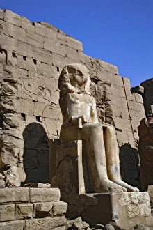 Pharaoh statue at entrance to Temple of Karnak, located at modern day Luxor or ancient Pharaoh statue at entrance to Temple of Karnak, located at modern day Luxor or ancient