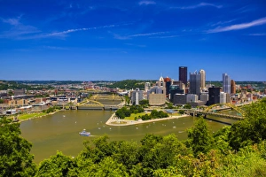 Pittsburgh, Pennsylvania. Aerial view of the city with rivers, bridges, and boats Pittsburgh, Pennsylvania. Aerial view of the city with rivers, bridges, and boats