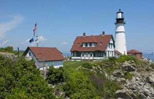 Portland Maine lighthouse famous Portland Head Light white with house on cliff Portland Maine lighthouse famous Portland Head Light white with house on cliff