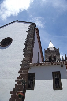 Portugal, Madeira Island, Funchal. Downtown clock tower of Gothic 15th century Roman Portugal, Madeira Island, Funchal. Downtown clock tower of Gothic 15th century Roman