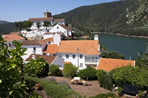 Portugal, Tomar, Castelo de Bode Dam and River Zezere. Tiled roofs of village houses Portugal, Tomar, Castelo de Bode Dam and River Zezere. Tiled roofs of village houses