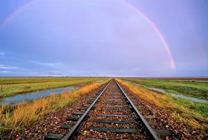 Rainbow over railroad tracks near Fairfield Montana Rainbow over railroad tracks near Fairfield Montana