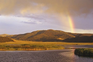 Rainbow over Widgeon Pond at the Red Rocks NWR, Montana, USA Rainbow over Widgeon Pond at the Red Rocks NWR, Montana, USA