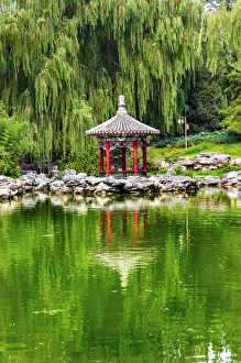 Red Pavilion Lotus Pads Garden Temple of Sun City Park, Beijing, China Willow Green Trees Red Pavilion Lotus Pads Garden Temple of Sun City Park, Beijing, China Willow Green Trees