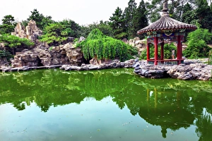 Red Pavilion Rock Garden Water Pond Reflection Temple of Sun City Park, Beijing Red Pavilion Rock Garden Water Pond Reflection Temple of Sun City Park, Beijing