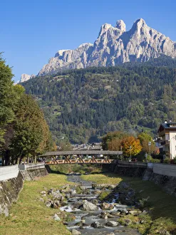 River Cismon, in the background Pale di San Martino. Fiera di Primiero in the valley of River Cismon, in the background Pale di San Martino. Fiera di Primiero in the valley of