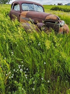Rusty old vehicles in the ghost town of Okaton, South Dakota, USA Rusty old vehicles in the ghost town of Okaton, South Dakota, USA