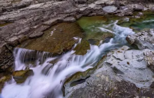 Sacred Dancing Cascade in McDonald Creek in Glacier National Park, Montana, USA Sacred Dancing Cascade in McDonald Creek in Glacier National Park, Montana, USA