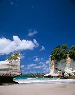 The sand beach at Catherdral Cove on the Coromandel Peninsula of the North Island The sand beach at Catherdral Cove on the Coromandel Peninsula of the North Island