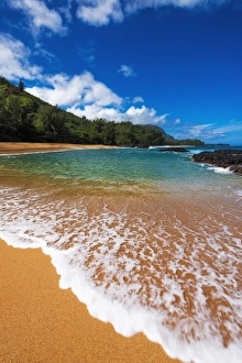 Sand and surf at Lumahai Beach, Island of Kauai, Hawaii USA Sand and surf at Lumahai Beach, Island of Kauai, Hawaii USA