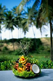 Sauipe, Brazil. Display of fresh fruits; pineapple, papaya, orange, guava, grapes, cocnut Sauipe, Brazil. Display of fresh fruits; pineapple, papaya, orange, guava, grapes, cocnut