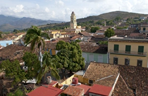 Scenic from above of old town of Trinidad Cuba with tile roofs and cobblestone streets Scenic from above of old town of Trinidad Cuba with tile roofs and cobblestone streets