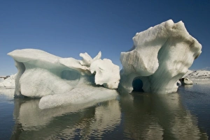 Sculpted Iceberg, Hornsund Fiord, on the western side of the southernmost tip of Spitsbergen island Sculpted Iceberg, Hornsund Fiord, on the western side of the southernmost tip of Spitsbergen island