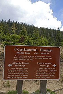 Sign marking the Continental Divide at Milner Pass in the Rocky Mountain National Park Sign marking the Continental Divide at Milner Pass in the Rocky Mountain National Park