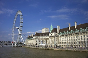 The South Bank of London showing the London Eye and County Hall along the Thames The South Bank of London showing the London Eye and County Hall along the Thames