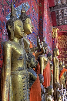 Southeast Asia, Laos, Luang Prabang. Statues of Buddha inside Buddhist temple. Credit as Southeast Asia, Laos, Luang Prabang. Statues of Buddha inside Buddhist temple. Credit as