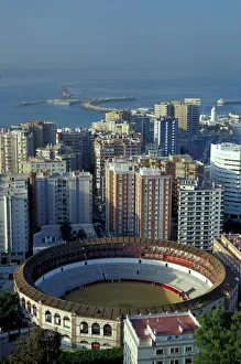 Spain, Malaga, Andalucia View of Plaza de Toros (bullring) and cruise ship in harbor Spain, Malaga, Andalucia View of Plaza de Toros (bullring) and cruise ship in harbor