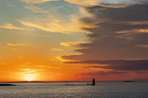 Spectacular sunrise clouds over Ram Island Ledge Lighthouse in Portland, Maine, USA Spectacular sunrise clouds over Ram Island Ledge Lighthouse in Portland, Maine, USA