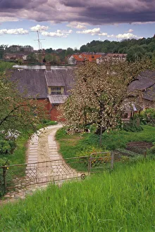 Spring time with rural house on the edge of city of Talsi in Kurzeme region of Latvia Spring time with rural house on the edge of city of Talsi in Kurzeme region of Latvia