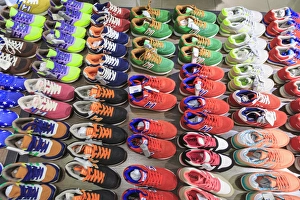 stacks of athletic shoes, shops around Nine Pedestrian Street, Guangzhou, China stacks of athletic shoes, shops around Nine Pedestrian Street, Guangzhou, China