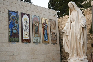 Statue of the Virgin Mary, mother of Jesus Christ, greets pilgrims and worshipers Statue of the Virgin Mary, mother of Jesus Christ, greets pilgrims and worshipers