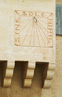 The sun dial with the carved stone inscription: Sine Sole Nihil The sun dial with the carved stone inscription: Sine Sole Nihil