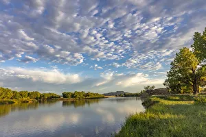 Sunrise and clouds over the Powder River near the confluence with the Yellowstone River Sunrise and clouds over the Powder River near the confluence with the Yellowstone River