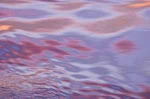 Sunset reflections; the movement of the water caused by the ship created this amazing mix Sunset reflections; the movement of the water caused by the ship created this amazing mix